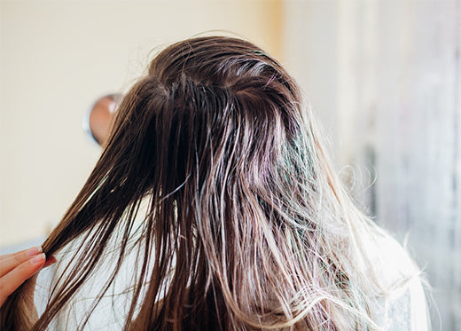 Here’s Why Your Hair Feels Greasy And What To Do About It